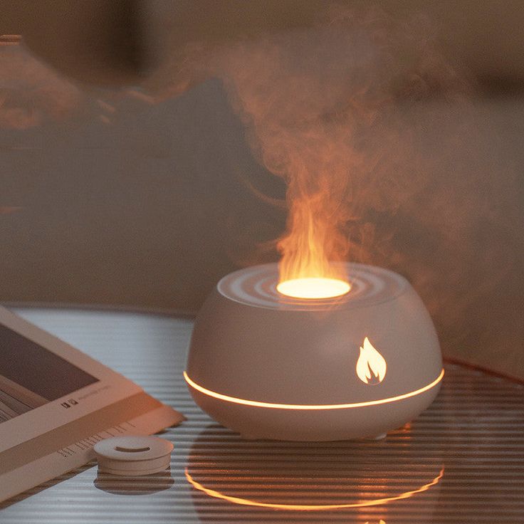 Diseño de Interiores: Claves para Reducir el Estrés en Casa 4 Flame Humidifier Aromatherapy Diffuser 7 Colors Light Home Air Humidifier 130ML USB Room Fragrance Essential Oil Diffuser Black USB